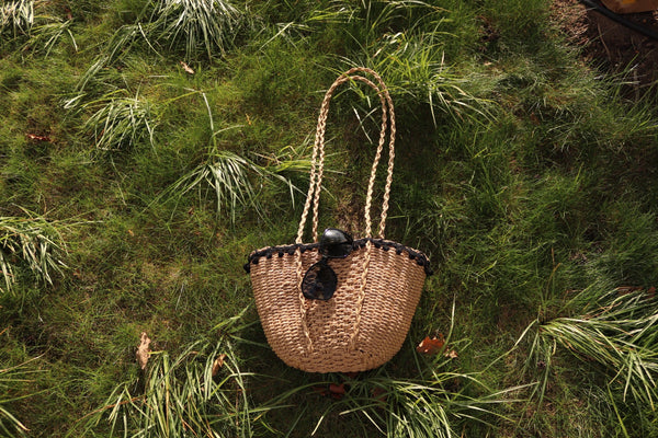 Straw Basket with pompoms - Contento London